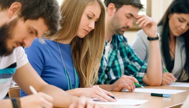 students having a test in a classroom